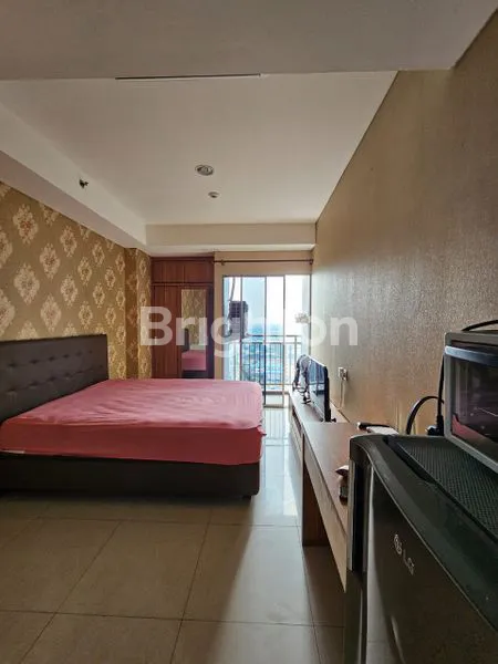 image APARTEMEN STUDIO SPRINGWOOS SIAP HUNI DEKAT KAMPUS BINUS ALAM SUTRA (1)