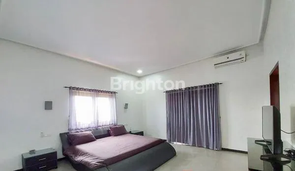 image TROPICAL HOME DI JIMBARAN, DEKAT PANTAI & TOL – IDEAL UNTUK KELUARGA MODERN\N\N.VILLA MEWAH & HOMEY DI KAWASAN TENANG JIMBARAN – 4 KAMAR, KOLAM, DAN TAMAN PRIBADI (3)