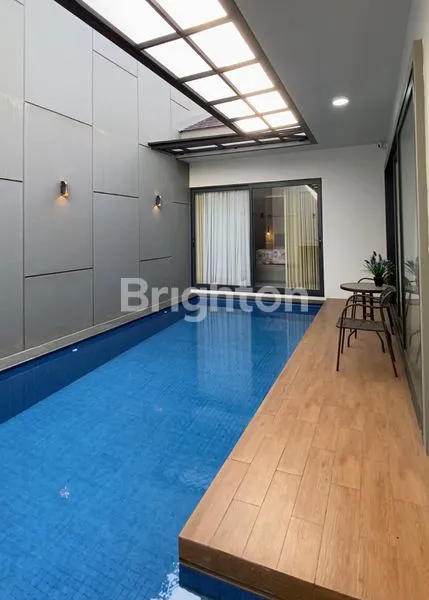 image DIJUAL RUMAH + SWIMMING POOL DI CLUSTER MIAMI KOTA WISATA (8)