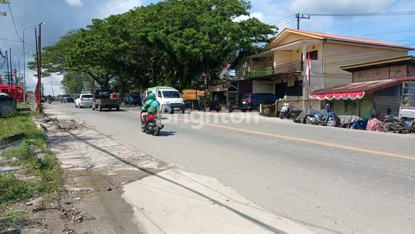 image DIJUAL TANAH STRATEGIS LOKASI JALAN POROS SOEKARNO - HATTA KM 13 COCOK DIBUAT GUDANG, WORKSHOP DAN RUKO HARGA NEGO (2)