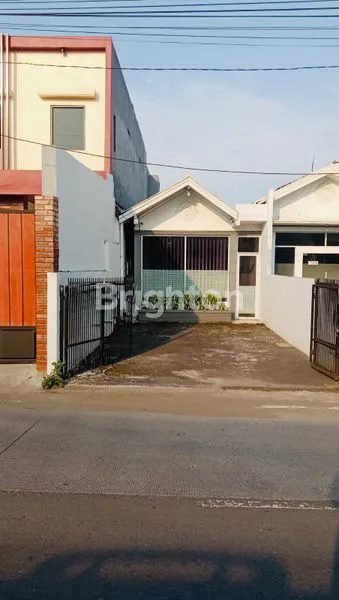 image JUAL RUMAH MUNGIL, CANTIK DAN TERAWAT, BISA UNTUK KANTOR, DITEPI JALAN RAYA UTAMA DI LOKASI STRATEGIS (1)