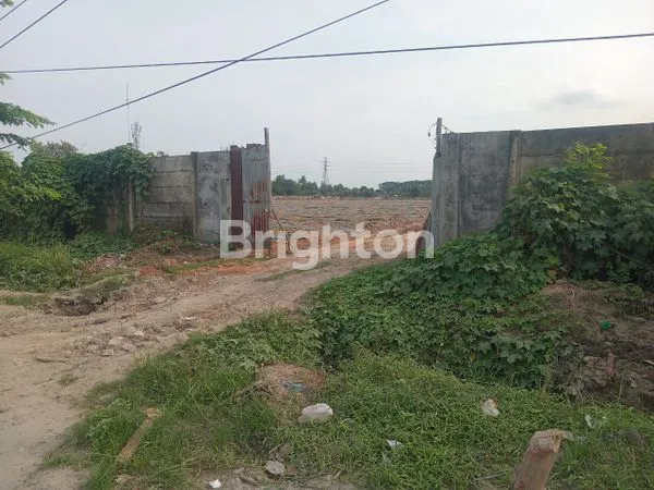 LAHAN SELUAS 6 HEKTAR, YANG SANGAT STRATEGIS DI PINGGIR JALAN LINTAS SUMATERA MEDAN - LUBUK PAKAM, COCOK UNTUK MEMBANGUN PABRIK, PERKANTORAN, MALL ATAU PERGUDANGAN, DEKAT DENGAN GERBANG TOL LUBUK PAKAM