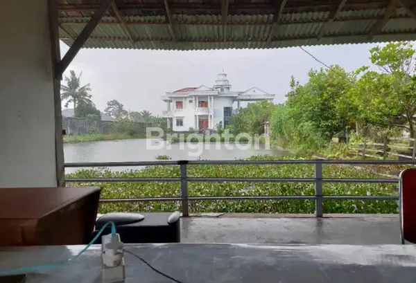 image MEGA ESTATE 1,3 HEKTAR DENGAN 3 RUMAH & 4 KOLAM – INVESTASI BESAR DI KOTA! (2)