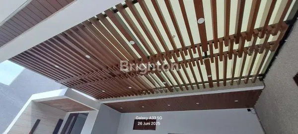 image RUMAH BARU KOMPLEK NOL JALAN MERR ADA KOLAM RENANG (2)