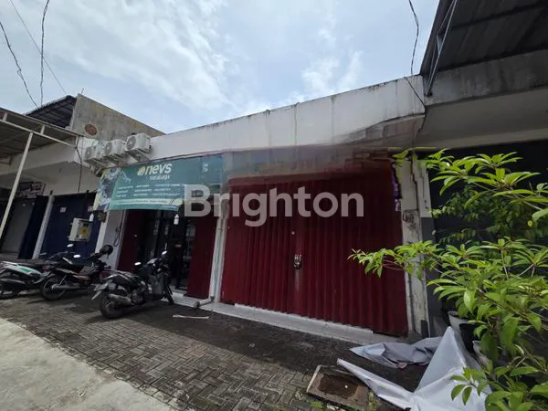 image RUKO 1.5 LANTAI NOL JALAN RAYA MANUKAN LANGSUNG CUAN TERSEWA SAMPAI 2027  (1)