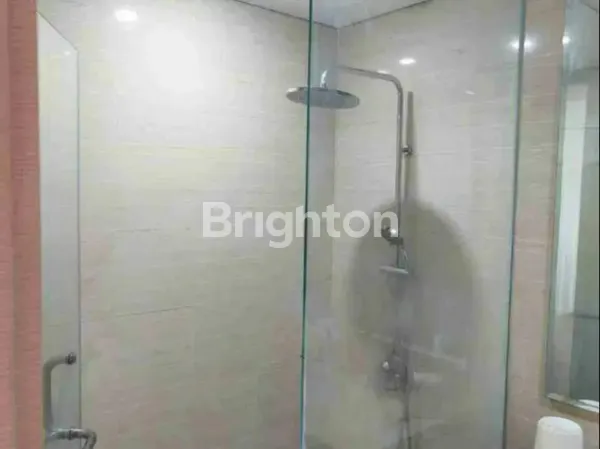 image DIJUAL RUGI APARTEMEN BAGUS, ONE EAST-SURABAYA (2)