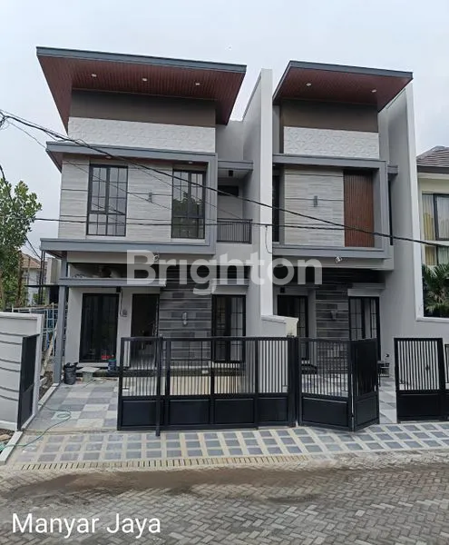 image RUMAH GRESS DI JALAN UTAMA MANYAR JAYA (1)