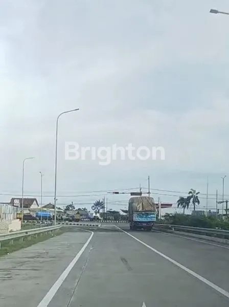 image TANAH MURAH DIJUAL SELUAS 24.670 M2 HANYA BERJARAK 150 METER DARI PINTU TOL GENDING PROBOLINGGO (1)