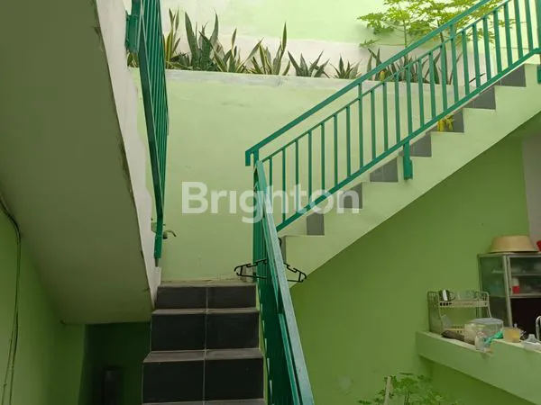 image RUMAH ASRI DENGAN LANTAI MEZZANINE DI PONDOK GEDE (4)