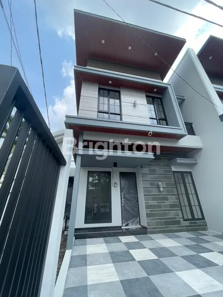 image RUMAH MANYAR JAYA SURABAYA MINIMALIS ROW JALAN 4 MOBIL (1)