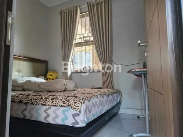 image HUNIAN KELUARGA MODERN DENGAN BACKYARD LUAS & FUNGSIONAL DI KAWASAN STRATEGIS BANJAR WIJAYA TANGERANG (3)