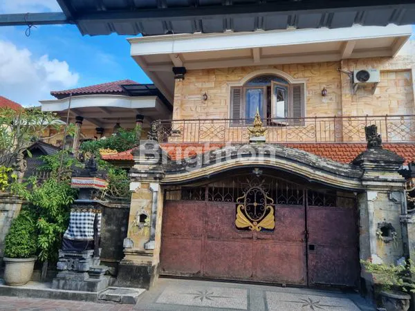 image FOR SALE A LARGE, TWO-STORY HOUSE WITH A PROMINENT TRADITIONAL BALINESE STYLE GATE IN KEROBOKAN, BALI (1)