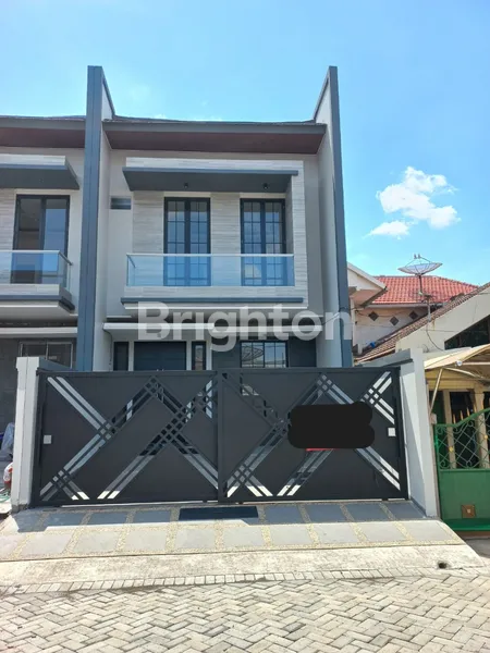 image RUMAH BARU GRESS MODERN MINIMALIS SIAP HUNI MANYAR KERTAADI (1)