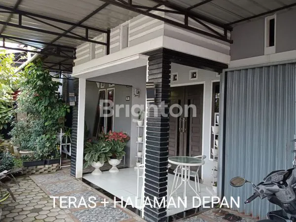 image RUMAH SIAP HUNI  LOKASI DEKAT DENGAN JALAN RAYA (2)