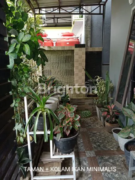 image RUMAH SIAP HUNI  LOKASI DEKAT DENGAN JALAN RAYA (8)