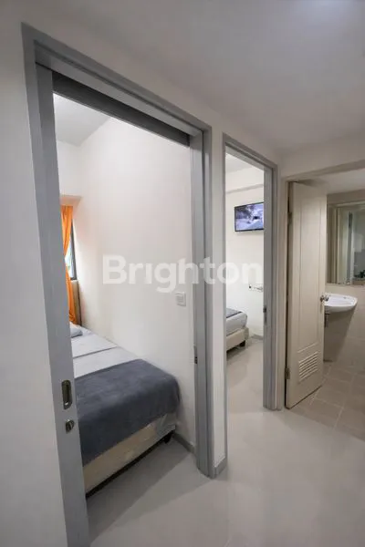 image HUNIAN MODERN & STRATEGIS DI OSAKA RIVERVIEW PIK 2 2BR SEMI FURNISHED LANTAI TINGGI SIAP HUNI (3)