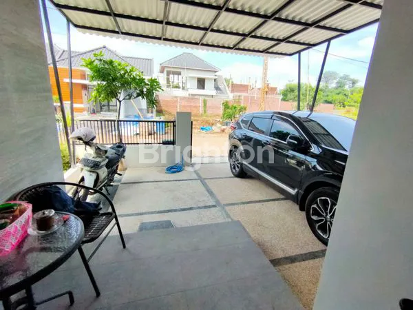 image RUMAH DEKAT TOL SAWOJAJAR SEMI PERABOT DI MALANG (2)