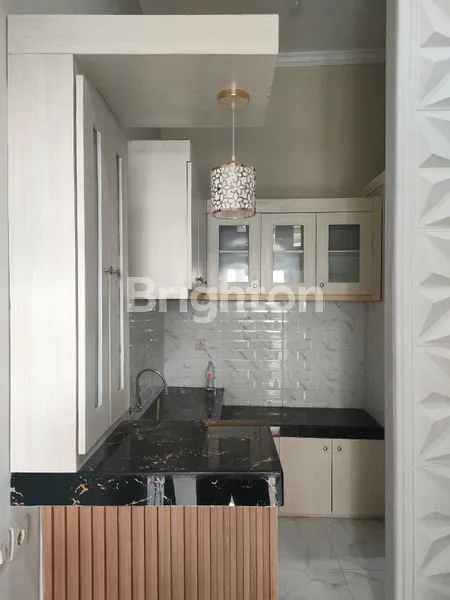 image DISEWAKAN RUMAH 2 LANTAI BARU GRESS DI LEBAK ARUM (5)