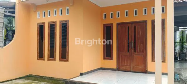 DISEWAKAN RUMAH DI TLOGOTIMUN  DEKET JALAN RAYA