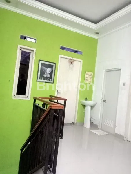 image DIJUAL RUMAH DALAM TOWNHOUSE DI LIMO, SUDAH DIRENOVASI DAN DIRAWAT PEMILIK. (3)