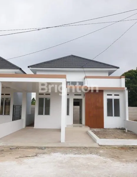 RUMAH CLUSTER LIMBUNGAN RUMBAI