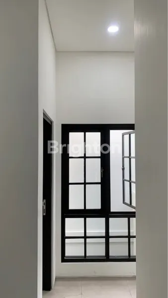 image RUMAH SIAP HUNI 2 LANTAI SELANGKAH KE MERR DI CLUSTER ECO MEDAYU SURABAYA (5)
