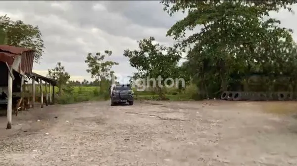 image TANAH LUAS PINGGIR JALAN RAYA KOTA PADANG (1)