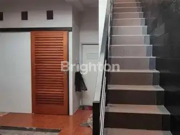 image RUMAH 2 LANTAI SIAP HUNI DI PURI SURYA JAYA (7)