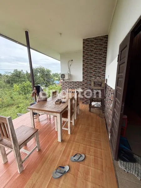 image TANAH DAN RUMAH DIJUAL DI KILO 9 (6)