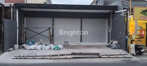 image DISEWAKAN TOKO DAN RUMAH TINGGAL DI BELAKANG TOKO  DI MONANG MANING (1)