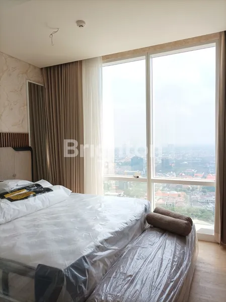 image APARTEMEN ONE ICON PUSAT TENGAH KOTA SBY, DEKAT TP, MEWAH MODERN 3BR FULL FURNISHED BARU (1)