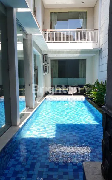 image RUMAH MEWAH DI DHARMAHUSADA INDAH ADA KOLAM RENANG DEKAT KERTAJAYA DAN GALAXY MALL (1)