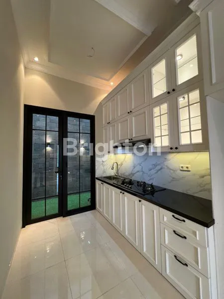 image RUMAH BAGUS BARU 2 LANTAI DICEMPAKA PUTIH JAKPUS (7)