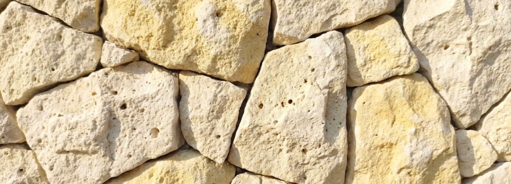 model batu alam dinding luar rumah 1