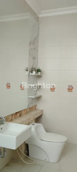 image RUMAH MINIMALIS SIAP HUNI LOKASI BAGUS JALAN KEMBAR DAERAH ELITE GRANADA PAKUWON INDAH SURABAYA BARAT (4)