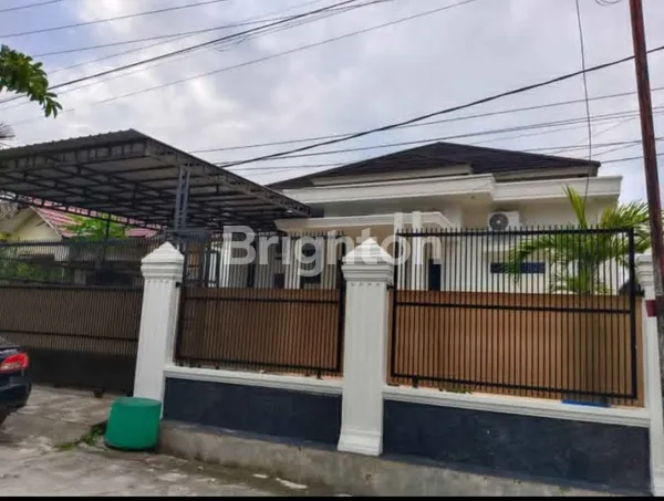 image RUMAH LEGALITAS LENGKAP (SHM + IMB) DI JL. TRITUNGGAL, PURWODADI, PANAM - GARASI 2 MOBIL. (1)