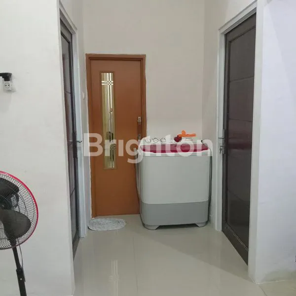 image RUMAH SIAP HUNI DI TRIRAKSA VILLAGE 2 TANGERANG (6)