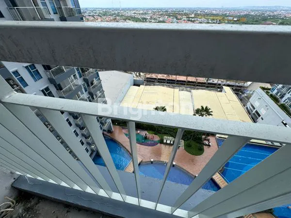 image DIJUAL CEPAT 2 UNIT APARTMENT BENSON PAKUWON MALL SURABAYA BARAT TYPE STUDIO, VIEW POOL (3)
