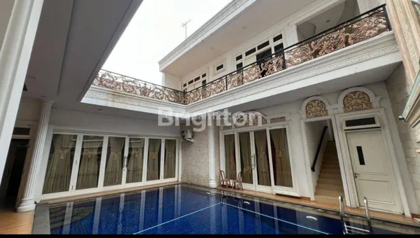 image RUMAH MEWAH 2 LANTAI DENGAN KOLAM RENANG DI DUREN SAWIT – LT 470 M², LB 650 M², SHM, 5+2 KT (1)