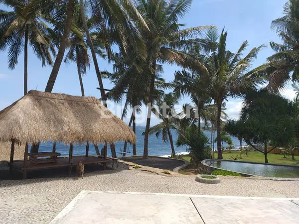 image TANAH BESERTA BANGUNAN RUMAH LOKASI STRATEGIS LOS PANTAI DI SERAYA KARANGASEM (2)