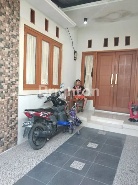 image RUMAH 1,5 LANTAI (1)
