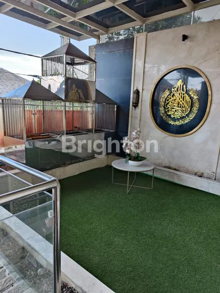 image HUNIAN ASRI DAN KOKOH  KONSEP 3 LANTAI, ADA KOLAM KOI (2)