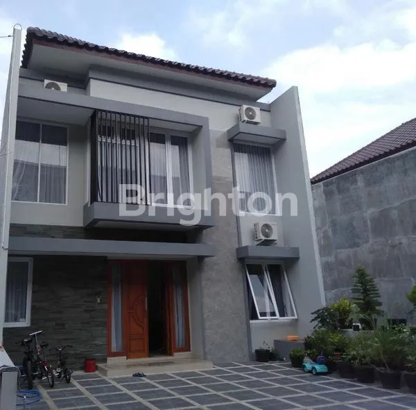 image RUMAH CLUSTER 2 LANTAI SOLO BARU (1)