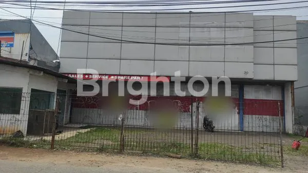 image JUAL GUDANG/TANAH BEKAS BENGKEL BESAR PINGGIR JALAN DI JALAN RAYA UTAMA. (1)