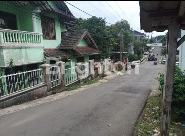 image RUMAH DUA LANTAI DI PINGGIR JALAN RAYA SIAP HUNI (2)