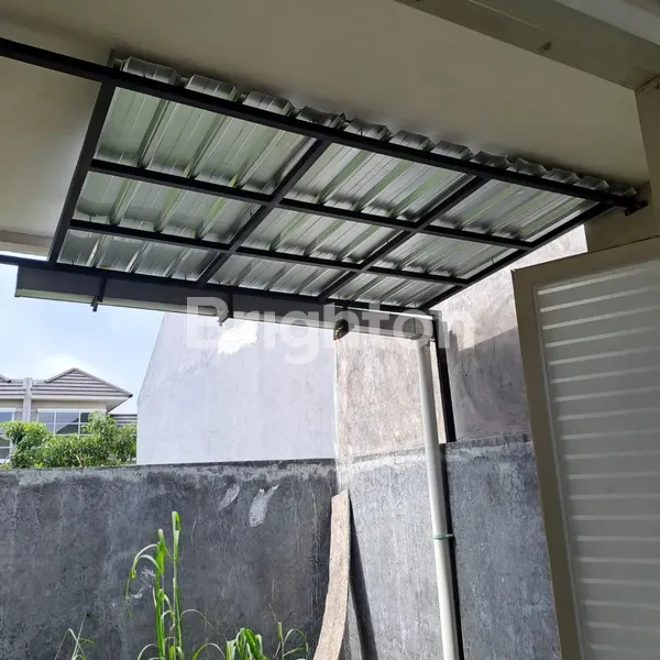 image RUMAH CLUSTER LOKASI STRATEGIS DI PURI SURYA JAYA (4)