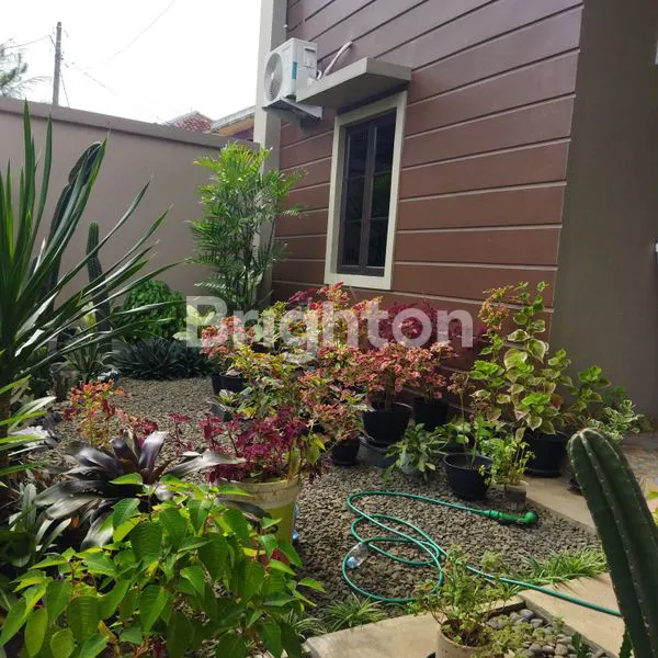image RUMAH KAMPUNG 2 LT DENGAN NUANSA VILLA (8)