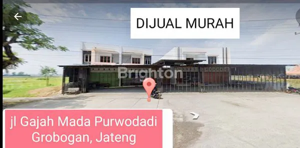 TANAH SIAP PAKAI DI JL GAJAH MADA PURWODADI GROBOGAN 8000 METER BONUS BANGUNAN GUDANG