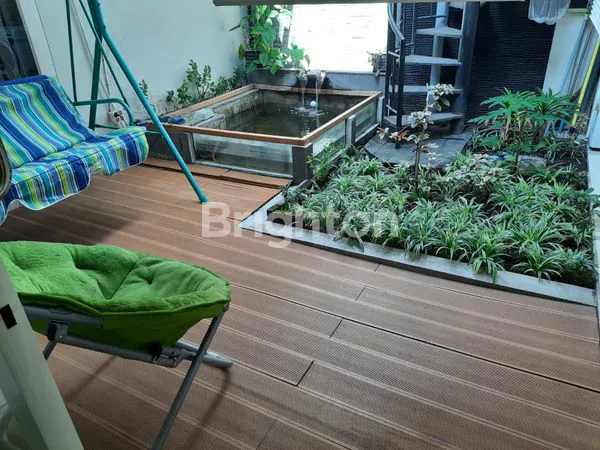 image RUMAH DENGAN TAMAN TERBUKA DI PURIMAS SURABAYA DEKAT UPN DAN MERR (7)