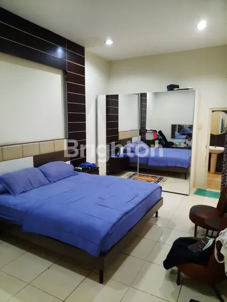 image RUMAH DENGAN TAMAN TERBUKA DI PURIMAS SURABAYA DEKAT UPN DAN MERR (3)